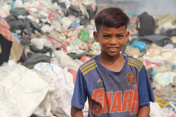 Boy at landfill who is part of LWB's landfill education program